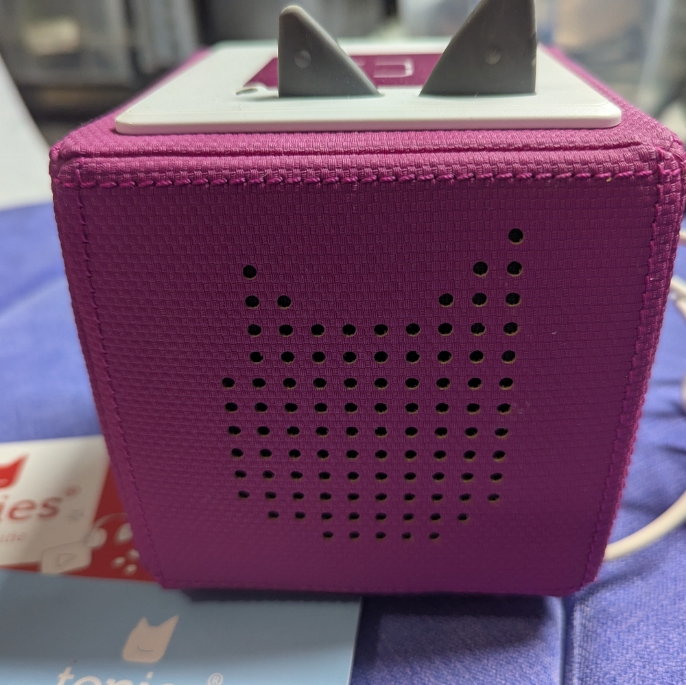 Purple Tonies box with charger